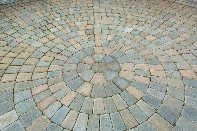 Circular paver medallion laid in a fan pattern